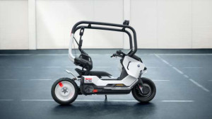 இனி ஹெல்மெட் தேவையில்லை..! பாதுகாப்பு கூண்டுடன் வரும் BMW Vision CE ஸ்கூட்டர்