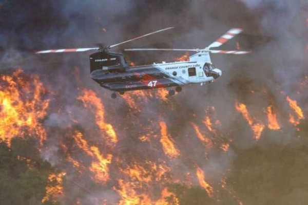 கனடாவில் பரவி வரும் காட்டுத்தீ! நூற்றுக் கணக்கான குடும்பங்களுக்கு வெளியேற்ற உத்தரவு