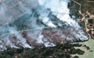 கனடாவில் பரவிவரும் காட்டுத்தீ ... வீடற்றோர் வெளியேற மறுப்பு